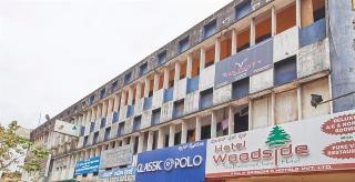 Woodside Hotel Mangalore Esterno foto